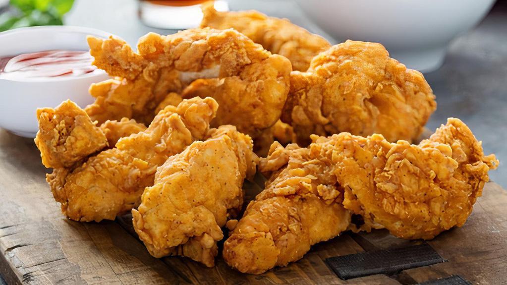 Chicken Tenders · Golden fried, crispy on the outside, juicy and tender on the inside chicken tenders. Choose your favorite dipping sauce!