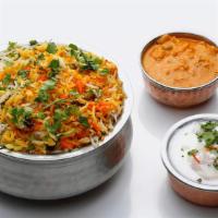Tc'S Special Veg Biryani · Exotic basmati rice with aromatic biryani spices, herbs, and fresh veggies.