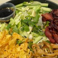Char Siu Bowl  · Our Bing Bowl with our signature Char Siu topped with our Bing Sauce. Consists of iceberg le...