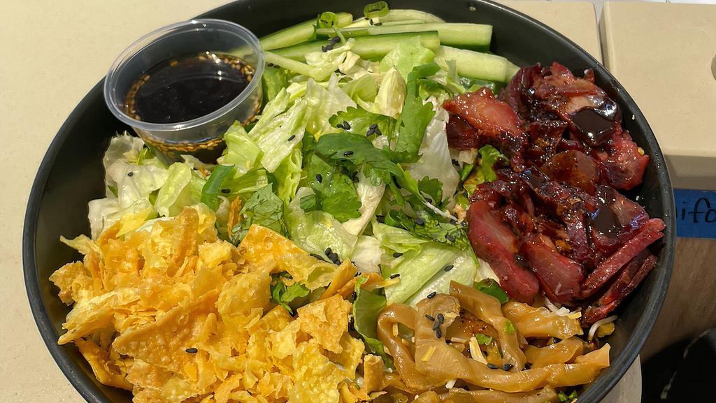 Char Siu Bowl  · Our Bing Bowl with our signature Char Siu topped with our Bing Sauce. Consists of iceberg lettuce, green onion, cilantro, cucumber, and wonton chips. Add your favorite meats or add ons!