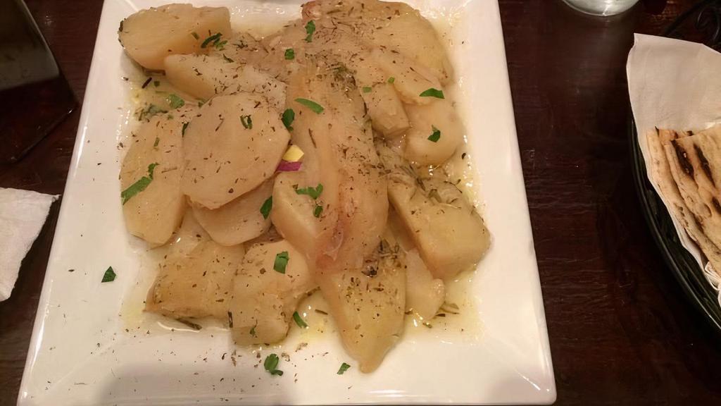 Roast Potatoes · With rosemary and lemon.
