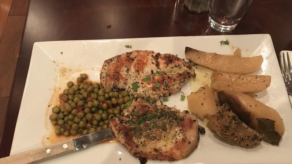 Chicken Breast · Grilled chicken breast marinated in olive oil and garlic.