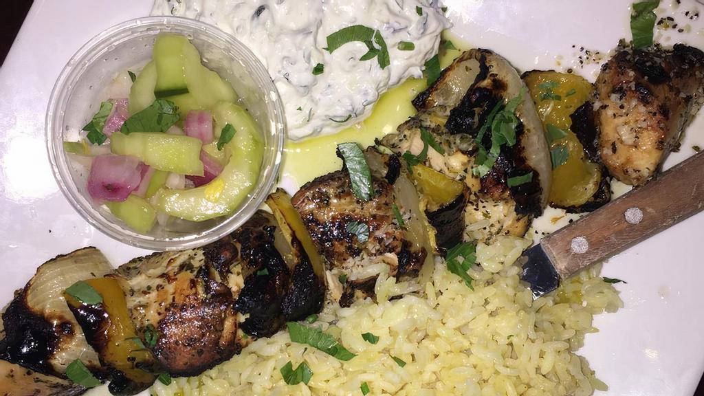 Chicken Souvlaki · Marinated cubes of chicken. served with tzatziki and cucumber relish and choice of roasted potatoes or rice.