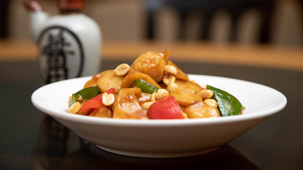 Kung Pao Chicken · Spicy. A spicy classic. Boneless chicken stir-fried with bell peppers, chestnuts and bamboo shoots. Topped with roasted peanuts.