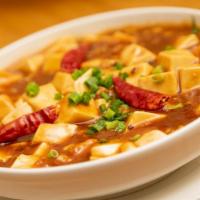 Ma Po Tofu (Veggie) · Spicy and vegetarian. Tofu cubes simmered in a rich soybean paste.