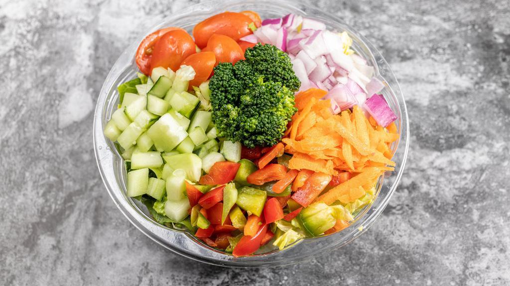 Garden House Salad · Romaine, tomato, cucumber, onions, peppers, carrots, choice of dressing.
