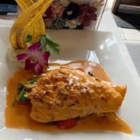 Red Snapper · Almond crusted cognac, lobster sauce, diced mango, tomatoes, spinach.