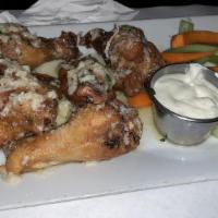 Large Buffalo Wings · Twelve wings served with blue cheese dressing, carrots and celery.