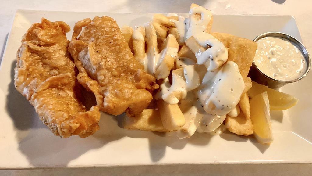 Fish And Chips · Beer battered cod golden fried, served with French fries and tartar sauce.