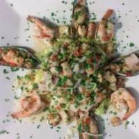 Ensalada De Mariscos · Seafood salad.
