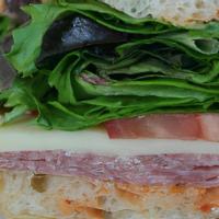 Salami Sandwich
 · Served with provolone, field greens and plum tomatoes, and your choice of bread and dressing.