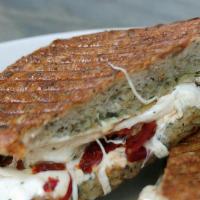 Fresh Mozzarella Panini
 · Served with sun-dried tomatoes, chopped basil and a touch of olive oil, and your choice of b...
