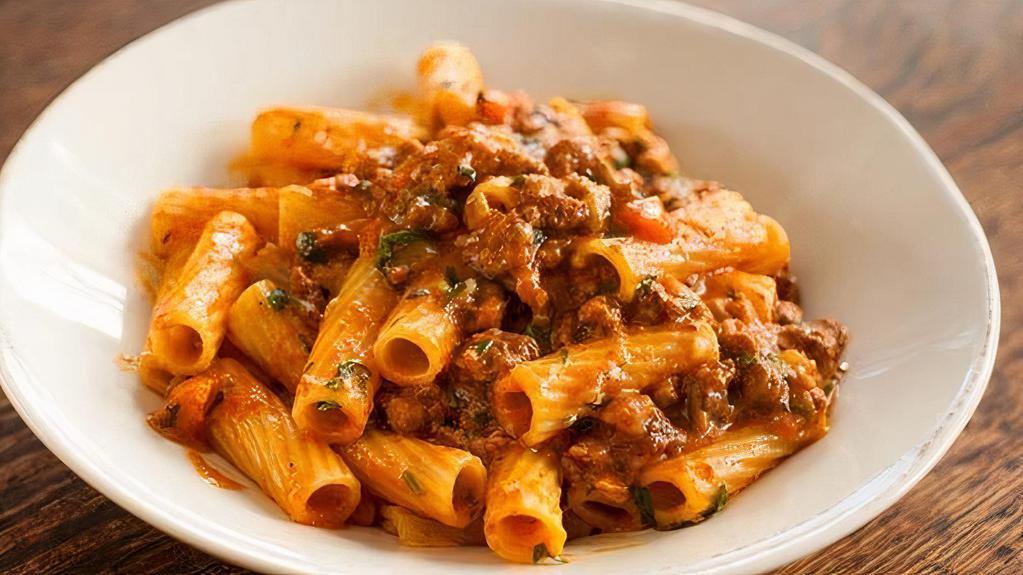 Rigatoni Bolognese · traditional beef and pork ragout