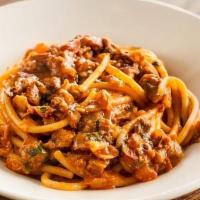 Bucatini Amatriciana · pancetta, onions, tomato sauce