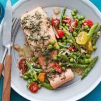 Salmon Filet · Sautéed salmon filet in a shallots-almonds sauce with creamed asparagus, sugar snap peas and...