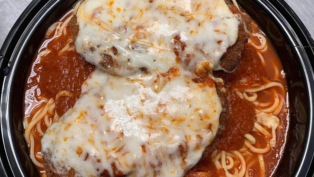Chicken Parmigiana Dinner · Golden fried chicken cutlets with tomato sauce with melted mozzarella, served your choice of penne or spaghetti.