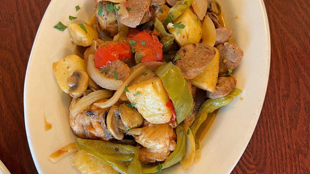 Chicken Scarpariello · Chicken off the bone, sweet Italian sausage, potato sautéed with roasted red peppers, mushrooms in buttery roasted garlic white wine sauce.