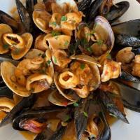Seafood Combination · Clams,shrimp,mussels, calamari in garlic white wine sauce or marinara sauce.