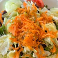 Garden · Mixed greens, tomatoes, cucumber, red onions, carrots, black olives.