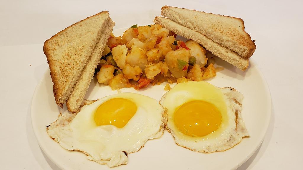 Breakfast Platter · Two eggs any style served with toast and home fries