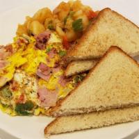 Omelette · Omelette (two eggs) served with home fries and toast