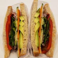 Delight Garden Sandwiches · tomato, alfalfa sprouts, peppers, cucumbers, red onion, carrots, mix greens, avocado on whea...