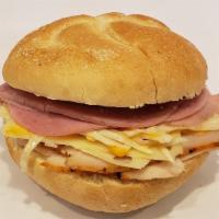 Special Sandwich #7 · Roast turkey, Virginia Ham, swiss, coleslaw, Russian dressing on roll