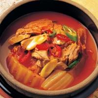 Kimchi Jji Gae 김치찌개 · Spicy kimchi soup served with rice