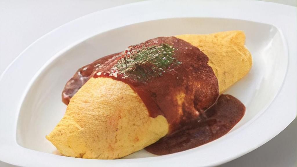 Omurice 오므라이스 · Fried rice wrapped in egg omelette