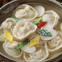Dumpling Soup 만두국 · Handmade dumpling in beef broth