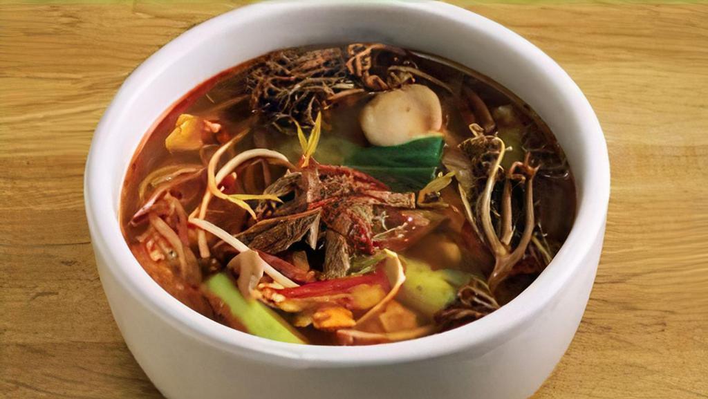 Yook Gaejang 육개장 · Spicy soup served with rice