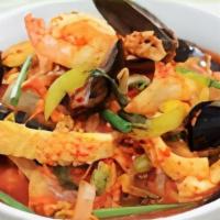 Jjam Ppong 짬뽕 · Spicy noodle soup with vegetables and choice of seafood or meat