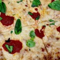 Vegan New Yorker Pizza · Tomato sauce, vegan cheese, basil
