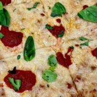 Vegan New Yorker Pizza · Tomato sauce, vegan cheese, basil