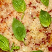 Gluten Free Vegan New Yorker Pizza · Tomato, vegan cheese, basil