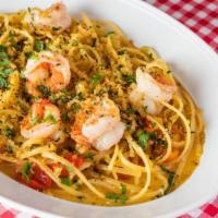 Shrimp Scampi Pasta · Lemon, garlic, white wine, tomato, butter
