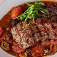 Ribeye Steak Pizzaiola · Tomato, olive, anchovy, fennel, pepperoncini
