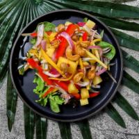 Thai Mango Salad · Mango, pineapple, cucumber, mix green, red onion, cashew nuts, and thai sweet chili sauce