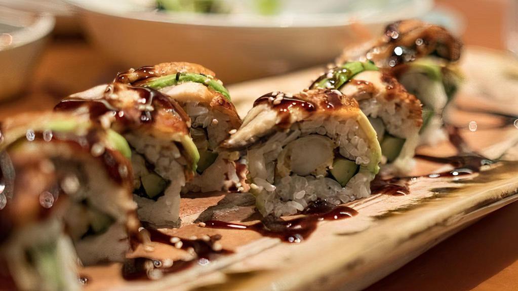 Dragon Tempura Roll (8 Pcs) · Tempura roll topped with broiled eel and avocado