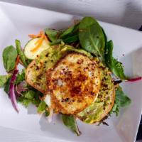 Avocado Toast · Avocado pepper flake spread, fried eggs on toasted whole bread served with salad.
