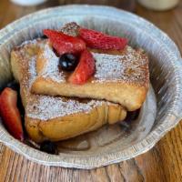 Vegan French Toast · Golden vegan french toast served with fruits.