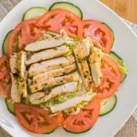 Grilled Chicken Greek Salad · Grilled chicken, romaine, tomatoes, bell peppers, onions, Kalamata olives, cucumbers, oregan...