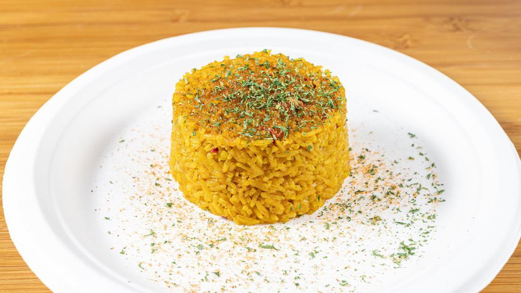 Peri Peri Rice · Jasmine rice, cooked in a blend of Peri Peri spices (mild) with red bell peppers.