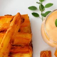 Yuca A La Huancaina · Steamed yuca  with spicy creamy cheese sauce
Additional items not in description is addition...