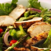 Grilled Chicken Salad · Served with lemon vinaigrette on the side side. Ensalada de pollo a la parilla.