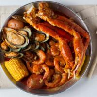 Combo C · 2 Lobster Tails + 2 Cluster Snow Crabs Legs. Choose 2 DIFFERENT Items from below; 1 LB Clams...