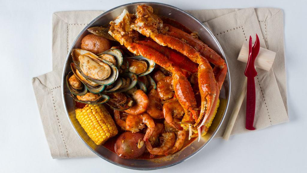 The Reel Catch · Pick 1 + Pick 2 Served in a bag, with your choice of seasoning and spice level. Includes: corn and potatoes.(shrimp head off for an extra charge).