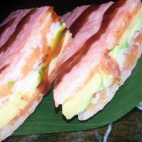 Aji Sandwich · Layers of spicy crunch salmon, crabmeat, avocado, and tamago inside wrap pink soy paper and ...