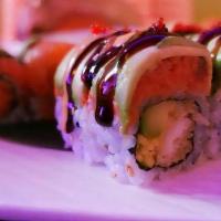 Astoria Roll · Raw. Spicy salmon, yellowtail and tempura crunch inside topped with salmon and avocado.
