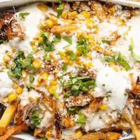 Elote Fries · Chipotle sauce, roasted jersey corn, string cheese, jalapeno crema, cilantro, queso cotija